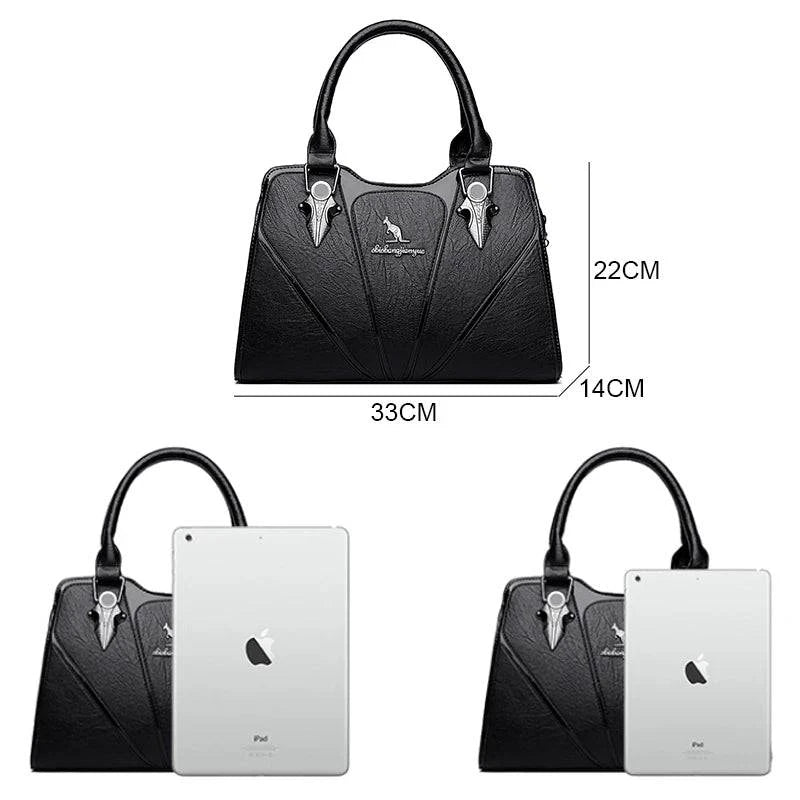 Alt text: Bolsa feminina de couro monarque em tom neutro elegante.