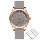 Relógio de pulso rosé com mostrador cinza floral e pulseira cinza