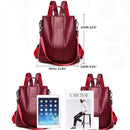 Mochila de couro vinho antifurto, vista frontal com dimensões de 30x32x14cm