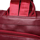 Mochila de couro vinho com alças em tecido vermelho e zíper
