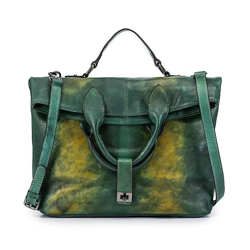 Alt text: Bolsa feminina de couro legítimo marrom, modelo Motaora elegante.