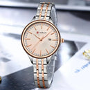 Relógio feminino com pulseira bicolor aço inox, mostrador com padrão raio de sol e marcadores em ouro rosé