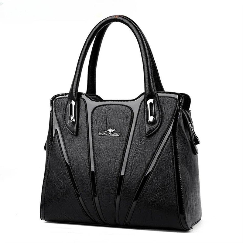Bolsa feminina de couro crossbody em tom neutro e elegante.
