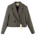 Blazer feminino vintage pied-de-poule com dourado fotografado em fundo branco
