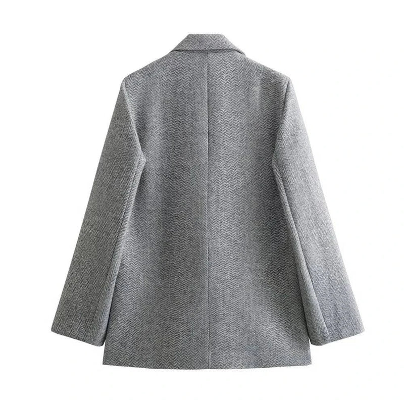 Parte traseira do Blazer Social Feminino Cinza, com corte reto e acabamento sofisticado para estilo profissional.