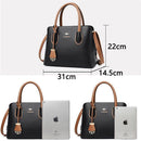 Bolsa preta com alças marrons; dimensões 31cm × 22cm × 14,5cm, comparada com iPad