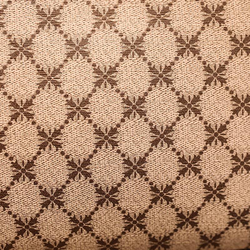 Bolsa Feminina de Couro Elite bege. Detalhe da estampa de monograma e textura do tecido. Acabamento refinado e exclusivo.