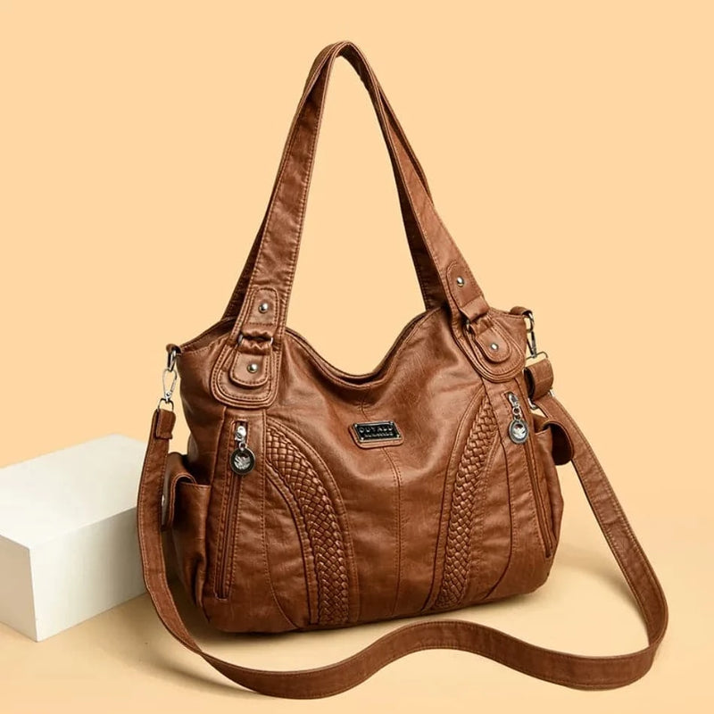 Bolsa feminina de couro legítimo marrom estilo charmosa, com detalhes trançados, bolsos frontais com zíper e alça longa ajustável
