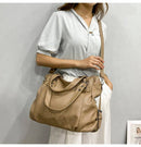 Bolsa feminina de couro bege com alças duplas, modelo Horizon