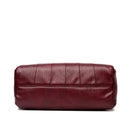 Bolsa de couro burgundy Horizon One com textura de frisos verticais, vista lateral