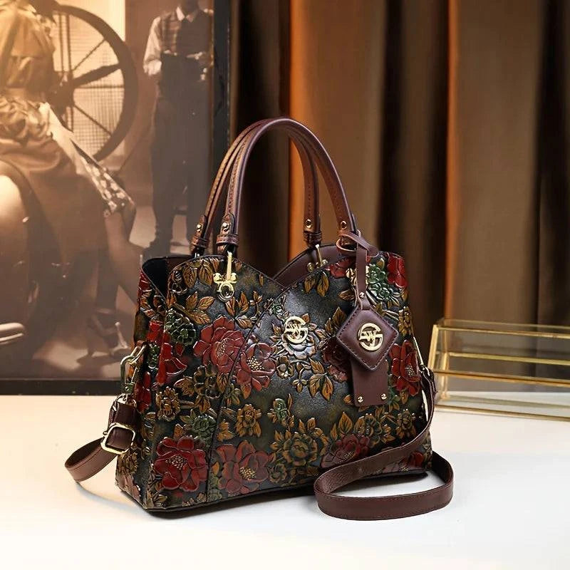 Bolsa Feminina de Couro Puro Luxo, estampa floral em relevo. Alças e ferragens douradas. Estilo vintage e luxuoso.