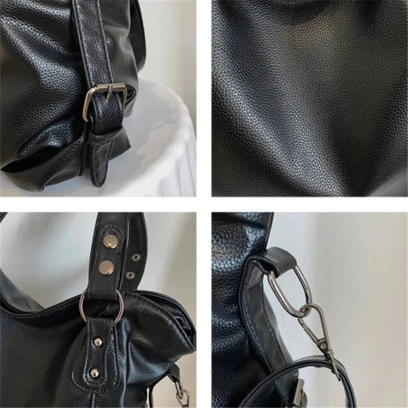 Bolsa Feminina Couro Sintético Casual Tote preta. Detalhes de textura do couro, fivelas e ferragens metálicas.