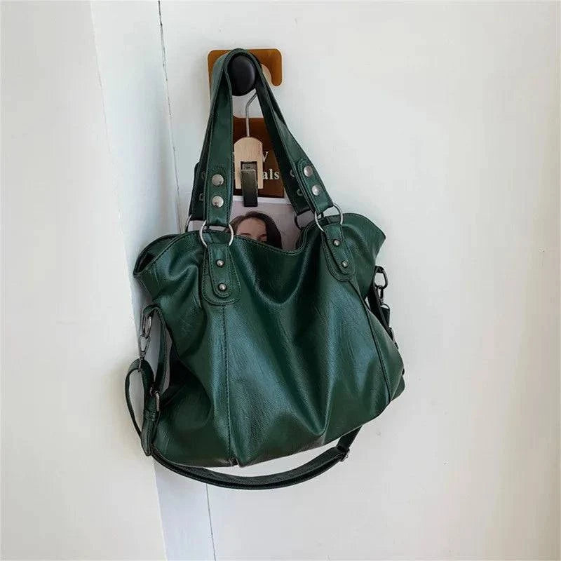 Bolsa Feminina Couro Sintético Casual Tote verde, design maleável e espaçoso. Ideal para o dia a dia e versátil.