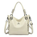 Bolsa tote feminina de couro cru com alças duplas e detalhes em metal