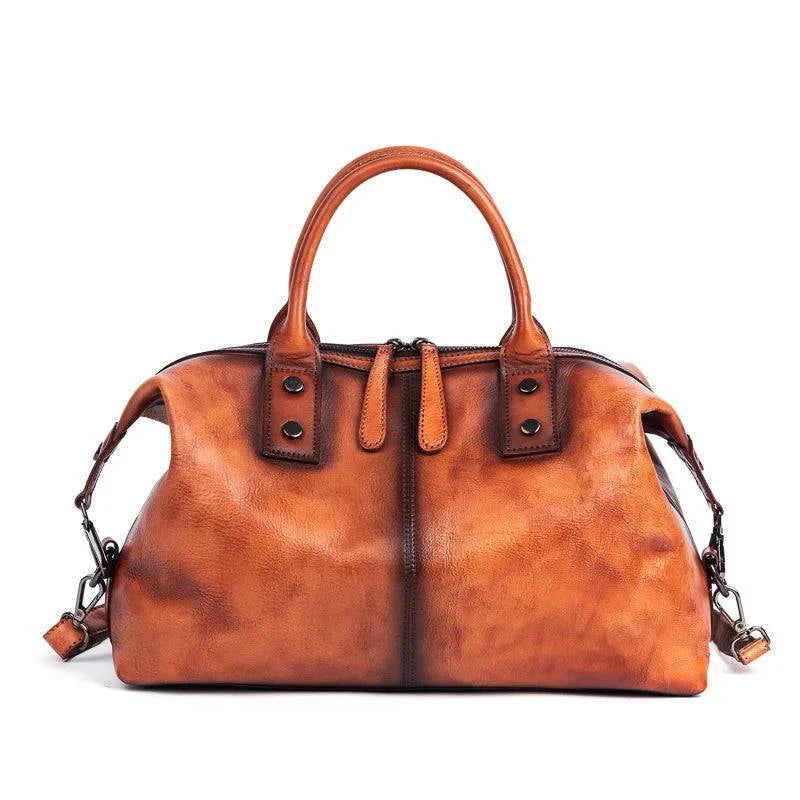 Bolsa Feminina Estruturada Legítimo Donna marrom, couro com acabamento vintage. Design elegante e espaçoso.
