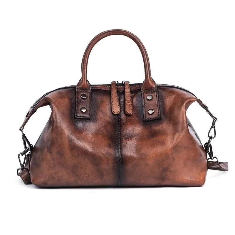 Bolsa Feminina Estruturada Legítimo Donna marrom, couro com acabamento vintage. Design elegante e espaçoso.