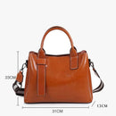 Bolsa tote feminina couro cognac com alças e correia ajustável, dimensões 31x23x13cm