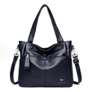 Bolsa tote de couro feminina azul marinho com alças ajustáveis e bolsos internos