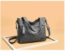 Bolsa tote feminina de couro cinza com alças duplas e transversal