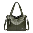 Bolsa tote de couro verde-oliva com alças duplas e alça transversal ajustável, bolsos com zíper.