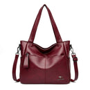 Bolsa tote de couro vinho com alças duplas e strap removível, bolsos com zíper
