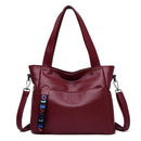Bolsa tote burgundy com alças duplas, alça transversal e tira decorativa LOVE