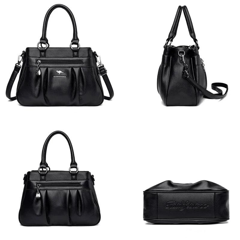 Bolsa Tote Estruturada Feminina Couro Radiance preta. Vistas frontal, lateral, inferior. Design com zíper, pregas e alças confortáveis. Elegante e completa.