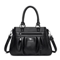 Bolsa Tote Estruturada Feminina Couro Radiance preta. Possui zíper frontal, ferragens prateadas e alças confortáveis. Elegante e funcional para o dia a dia.