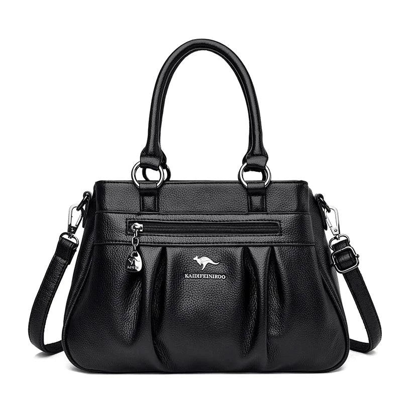 Bolsa Tote Estruturada Feminina Couro Radiance preta. Possui zíper frontal, ferragens prateadas e alças confortáveis. Elegante e funcional para o dia a dia.