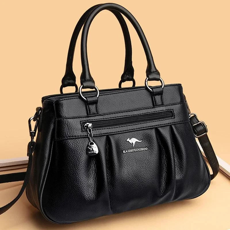 Bolsa Tote Estruturada Feminina Couro Radiance preta. Possui zíper frontal, ferragens prateadas e alças confortáveis. Elegante e funcional para o dia a dia.