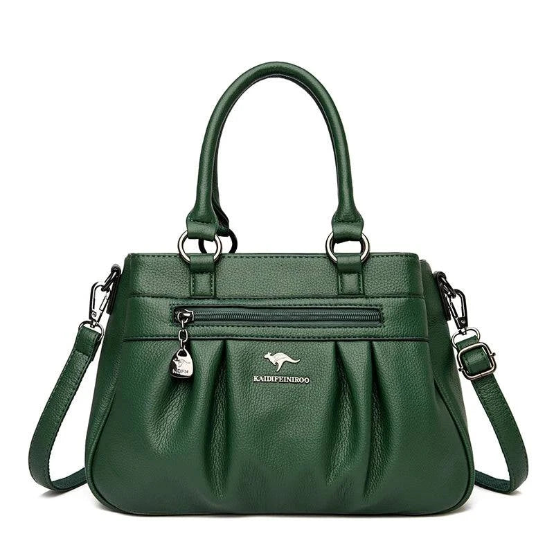 Bolsa Tote Estruturada Feminina Couro Radiance verde-escuro. Zíper frontal, pregas, ferragens prateadas. Elegante e funcional para o dia a dia.