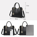 Bolsa tote feminina preta em couro com detalhes dourados e charm, 26x23x9cm