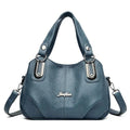 Bolsa Tote Feminina Estruturada Pequena azul, couro macio, ferragens prateadas. Prática e charmosa.