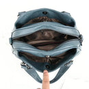 Bolsa tote estruturada azul aberta mostrando compartimentos internos e divisória com zíper