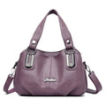 Bolsa Tote Feminina Estruturada Pequena lilás, couro macio, ferragens prateadas. Prática e charmosa.