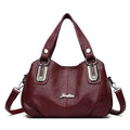 Bolsa Tote Feminina Estruturada Pequena vinho, couro macio, ferragens prateadas. Charme e praticidade no dia a dia.