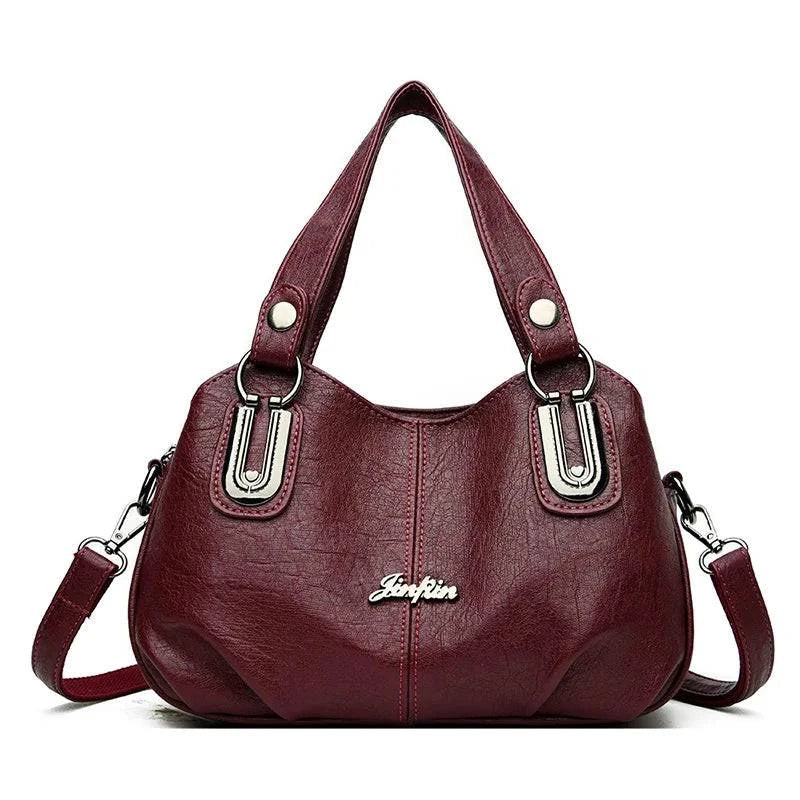 Bolsa Tote Feminina Estruturada Pequena vinho, couro macio, ferragens prateadas. Charme e praticidade no dia a dia.