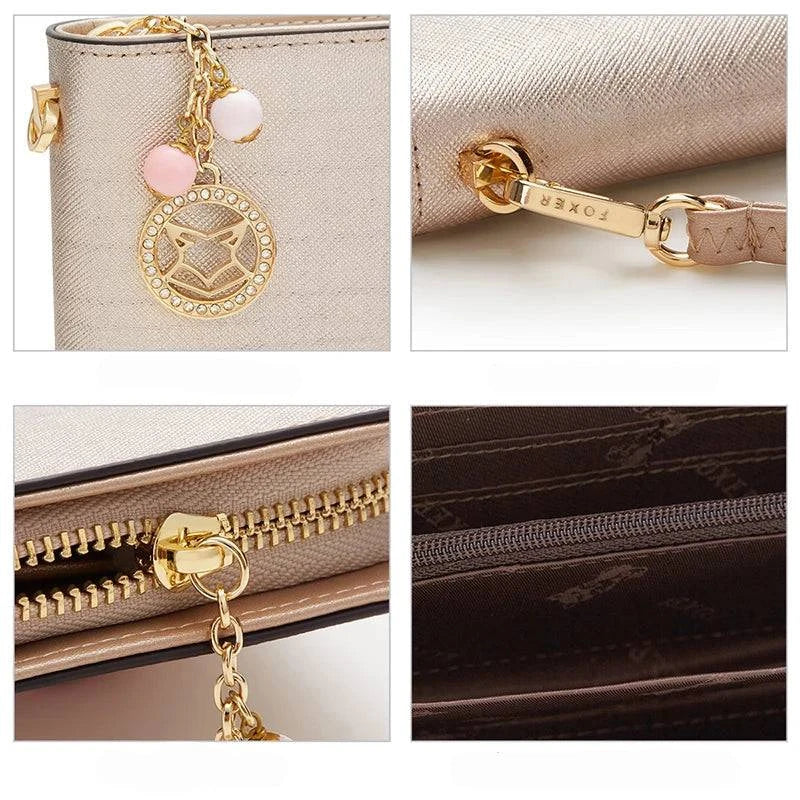 Detalhes da carteira feminina de couro premium dourada/champanhe: close-ups do charm de raposa com bolinhas, encaixe da alça de pulso, zíper externo e bolso interno com zíper, exibindo os acabamentos.