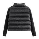 Jaqueta puffer feminina preta com painel acolchoado e mangas lisas em malha