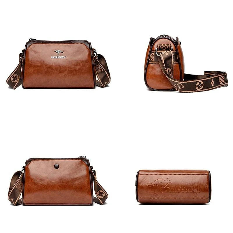 Shoulder Bag Bolsa Feminina de Couro marrom. Vistas frontal, lateral, traseira e inferior. Alça estampada e logo de canguru. Completa e funcional.