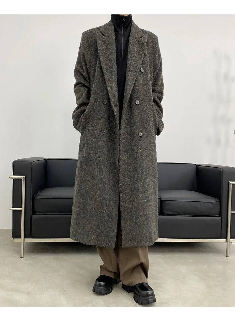 Sobretudo masculino longo social cinza com abotoamento duplo, perfeito para moda outono/inverno com toque europeu.